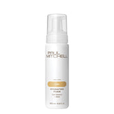 Espuma hidratante de Paul Mitchell para rizos con memoria y brillo.