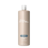 Shampoo One de Paul Mitchell muestra espuma cremosa para limpieza suave y equilibrante.