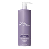 Shampoo violeta Paul Mitchell Rubio Platino en botella, neutraliza tonos amarillentos.