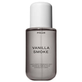 PHLUR Vanilla Smoke bottle being poured for a luxe everyday mist