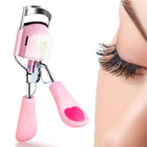 Pinkiou curvador de pestañas con calor en mano, fácil de usar.