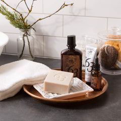 No.63 lotion ingredient card highlights glycerin, shea oil, and aloe for moisturization