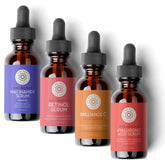 Pure Body Naturals Serum Facial: conjunto de botellas para hidratación diaria.