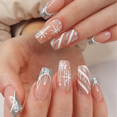 Uñas Puyokinm navideñas de copos de nieve, ideal para looks festivos