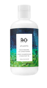 R+Co Atlantis Acondicionador B5, botella elegante, hidratación profunda para cabello seco.