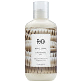 R+Co Ring Tone Gel Crème: bouteille 177 ml pour boucles définies et brillance.