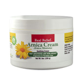 Real Relief Arnica Cream con absorción rápida para alivio localizado durante el masaje.