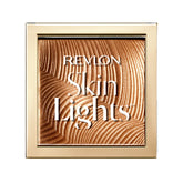 REVLON Skinlights Bronceador prisma con textura sedosa para brillo natural.