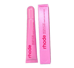 Rhode tinte labial de péptidos en envase, tono rosado translúcido para look natural.