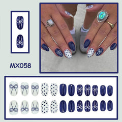 RIICFDD uñas acrílicas brillantes azul oscuro, acabado con lazo para un look elegante.
