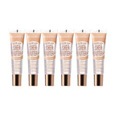 Ruby Kisses Broadway Vita-Lip botella con aplicador para un brillo suave.