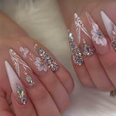 Uñas RUOKEXIN estileto con cristales para un look glamoroso y duradero.