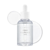 S.NATURE Aqua Squalane Serum, botella iluminada, hidratación suave para piel cansada.