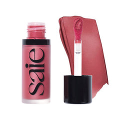 Saie Dew Liquid Blush montre le flacon et l'applicateur facilitant une application précise.