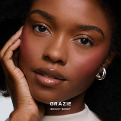 Saie SuperSuede Blush swatch on cheek for natural, soft-focus finish.