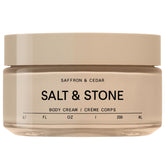 Salt & Stone crema corporal azafrán-cedro, textura sedosa para piel suave e hidratada.