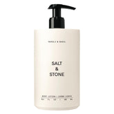 Salt & Stone crema corporal Neroli Albahaca en botella para hidratación diaria.
