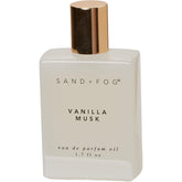Sand + Fog Vanille Musk huile roll-on sur peau, parfum intime durable.
