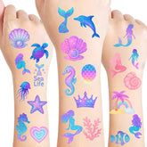 Tatuajes de sirena de Sanki94 que brillan en la oscuridad para fiestas infantiles.