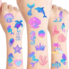 Tatuajes de sirena de Sanki94 que brillan en la oscuridad para fiestas infantiles.