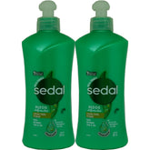 Sedal Rizos Definidos crema para peinar, definición duradera en botella de 300 ml.
