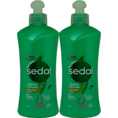 Sedal Rizos Definidos crema para peinar, definición duradera en botella de 300 ml.