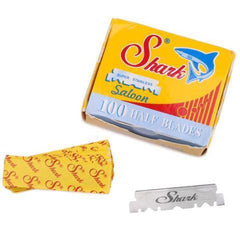 Shark: paquete de 100 cuchillas para barberos, envueltas individualmente.