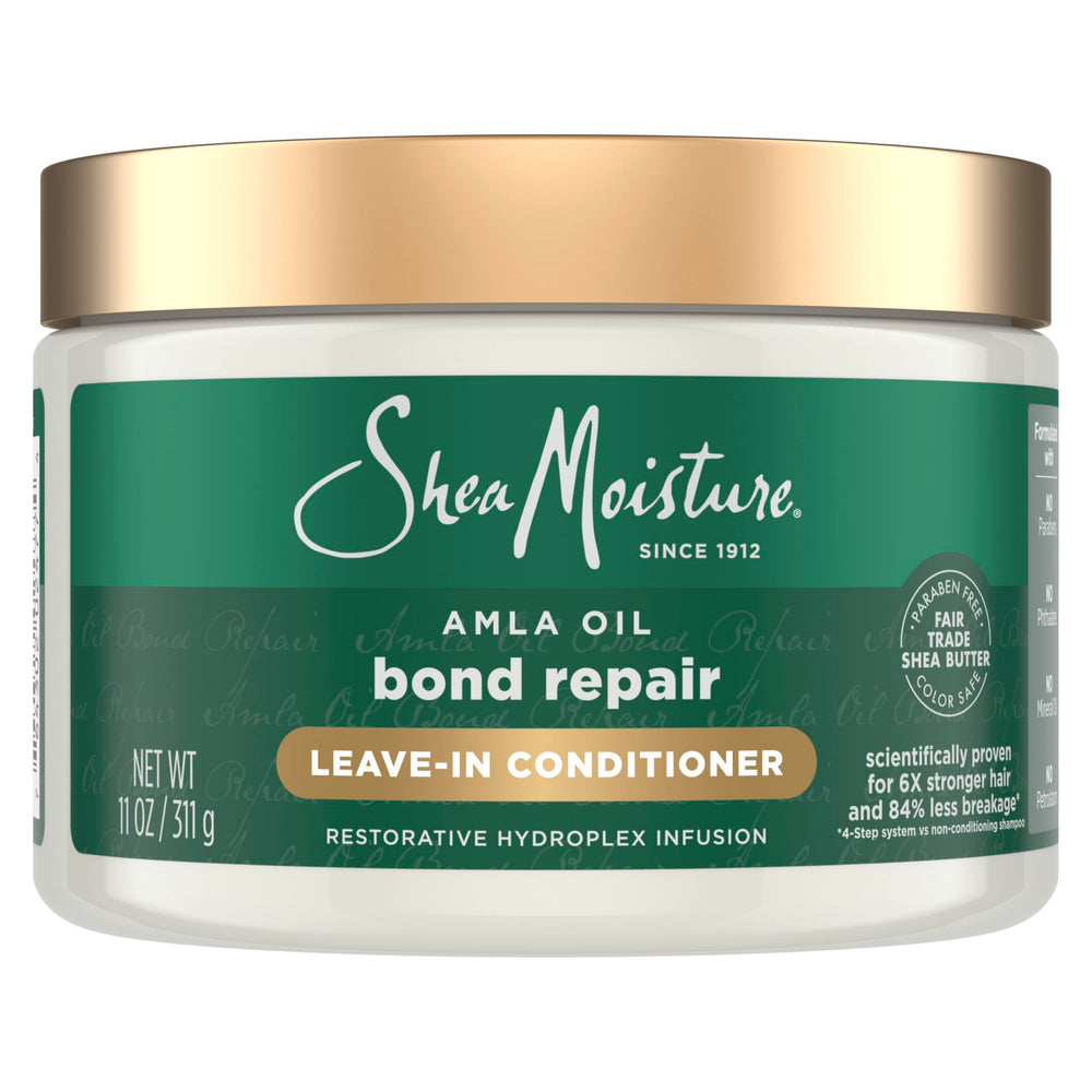 Botella de SheaMoisture Bond Repair con aceite Amla para reparación capilar.