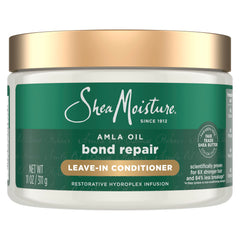 Botella de SheaMoisture Bond Repair con aceite Amla para reparación capilar.
