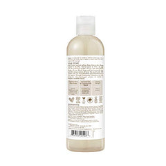 Ducha con lavado corporal cremoso de coco para piel suave.