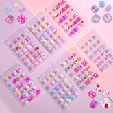 Uñas postizas Shynek para niñas con colores variados; ideal para decorar con seguridad.