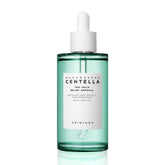 SKIN1004 Tea-Trica Relief Ampoule muestra la botella y gotas para hidratación suave