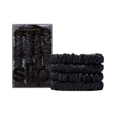 SLIP Silk Skinny Scrunchies negro vista frontal, seda suave para uso diario sin marcas.