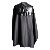 SMARTHAIR capa profesional negra, vista frontal, protege la ropa durante lavado del cabello