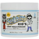 Suavecito Kid’s Pomade bottle pour with calming chamomile scent for gentle styling.
