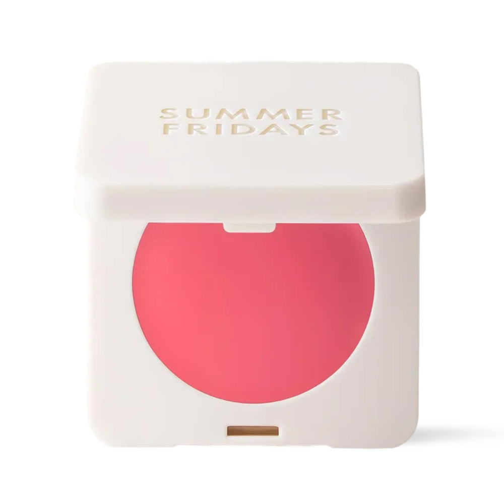 Summer Fridays Blush Butter Balm Pink Sunset tube close-up showing travel-ready color.