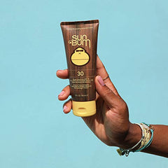 Sun Bum Original SPF 30 sunscreen lotion packaging indicating travel-friendly size.