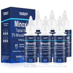 Tacruitf Minoxidil con Biotina, botella visible para uso diario y fortalecimiento capilar.