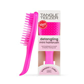 Tangle Teezer Ultimate Detangler mini rosa para bolso y viaje, desenreda con suavidad.