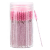 Aplicadores desechables de Tbestmax para pestañas rosa con envase, ideal para viaje e higiene.