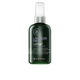 Tea Tree Lavender Mint bouteille nocturne pour nourrir les cheveux secs et bouclés.