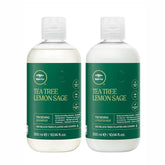 Tea Tree Lemon Sage champú engrosante en botella para mayor volumen.