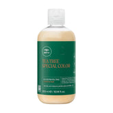 Conditionneur Tea Tree Special Color en bouteille — démêle et protège la couleur.
