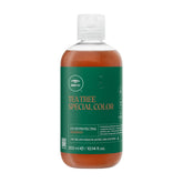 Tea Tree Special Color Shampoo – bouteille montrant le tingle rafraîchissant sur le cuir chevelu.