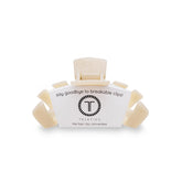 Teleties pinza pequeña en tono almendra-beige, ideal para cabello fino y peinados simples.