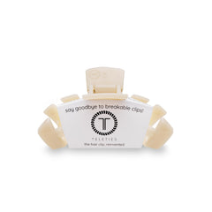 Teleties pinza pequeña en tono almendra-beige, ideal para cabello fino y peinados simples.