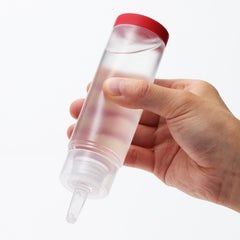 TENGA Lotion TLO-002 Rouge: vue arrière des bouteilles et du packaging rouge.