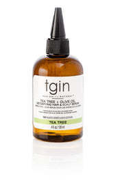 Sérum tgin en botella con árbol de té y aceite de oliva para cuero cabelludo limpio.