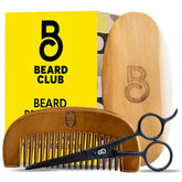 The Beard Club boar bristle brush for even oil distribution and shine.