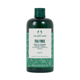 The Body Shop Tea Tree Skin Clearing Facial Wash bottle pour for daily cleansing and oil control.